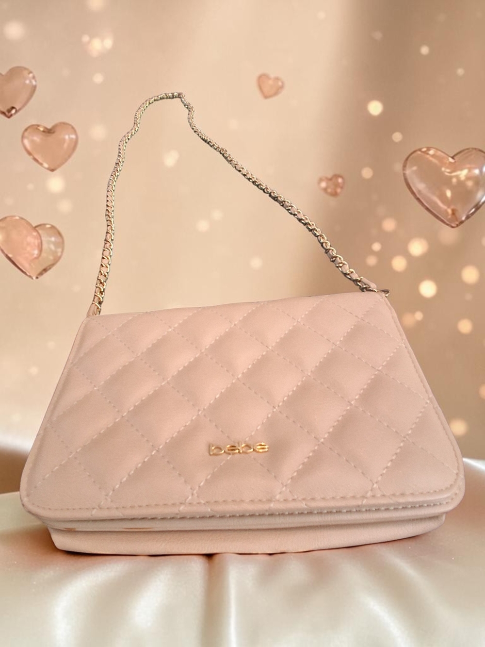Blush Quilted Crossbody Bag by BEBE Features a Diamond Pattern and a Gold Chain